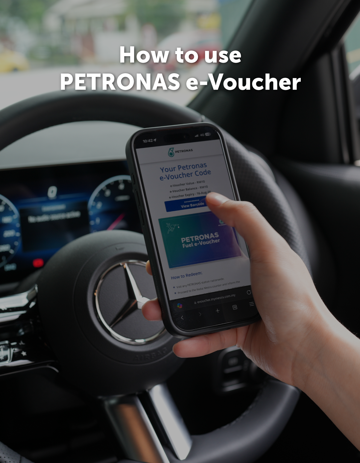 Driver holding a phone showing a PETRONAS e-Voucher barcode screen